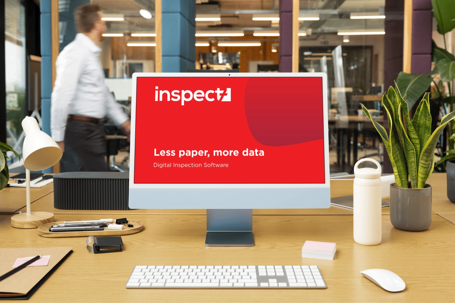 A desktop with a red screen and the Inspect7® logo